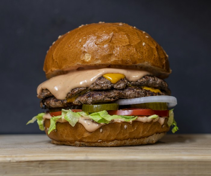 A freshly prepared burger at a local restaurant